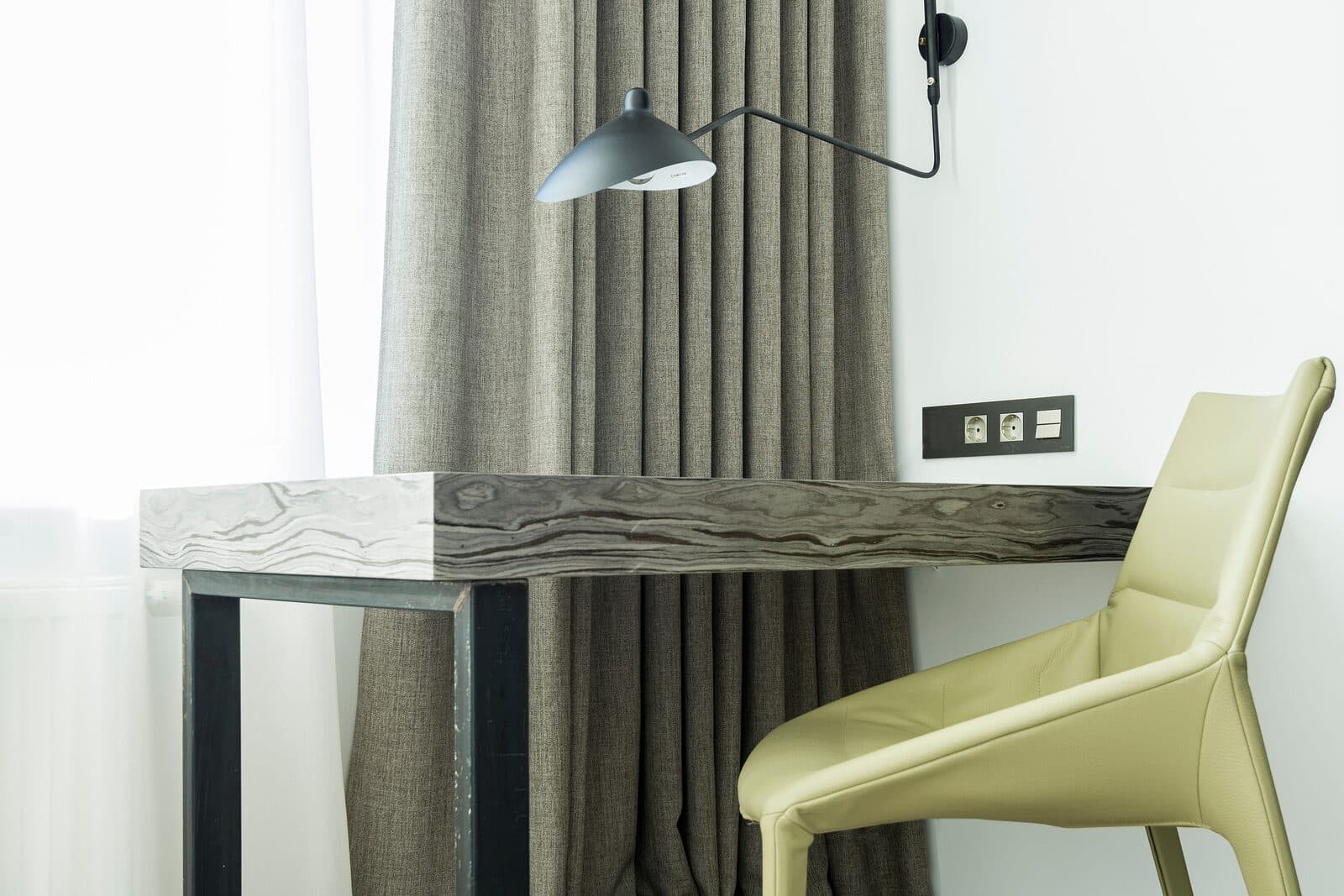 Floor-to-ceiling curtains on a concealed track in a study