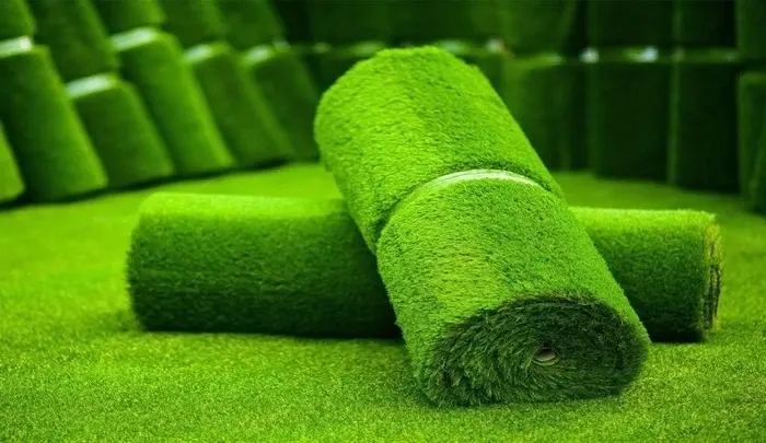 Artificial grass rolls staged for a Dubai villa install