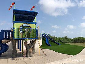 Kids play area with synthetic grass surface - Playgrounds, Dubai