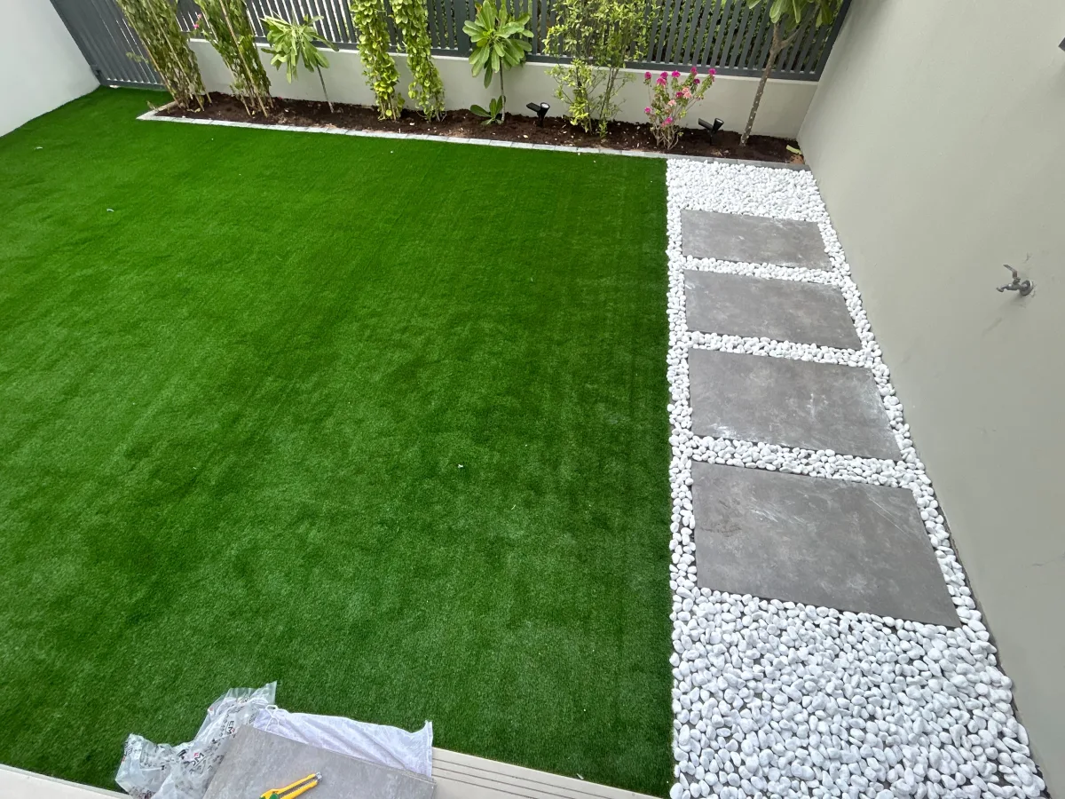 Completed Jumeirah villa lawn with pebble and paver path